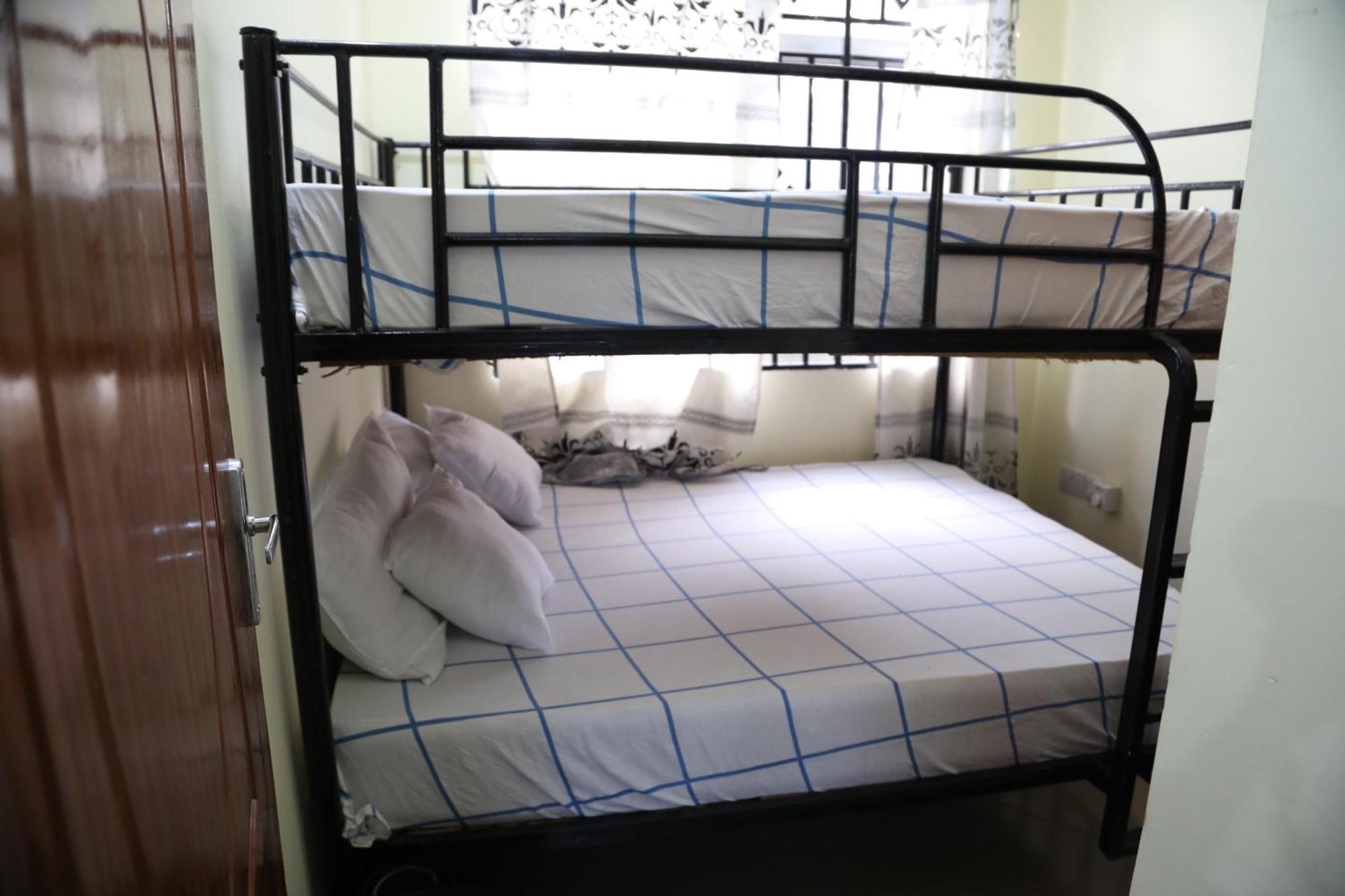Pearl Lulu Modern Bnb Homestay Νταρ ες Σαλάμ Δωμάτιο φωτογραφία